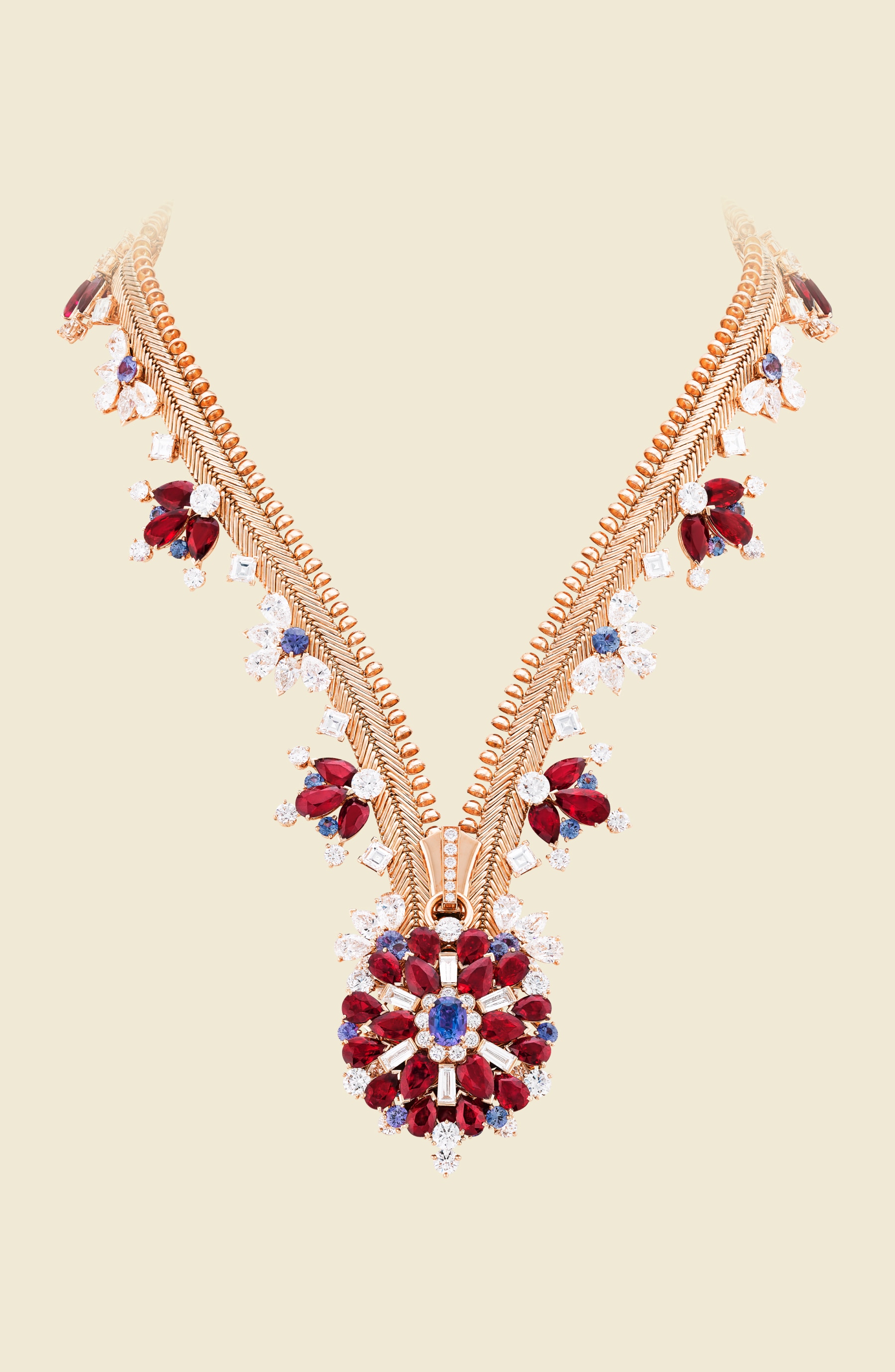 AN ICONIC RETRO GOLD, RUBY AND DIAMOND 'ZIP' NECKLACE, VAN CLEEF & ARPELS