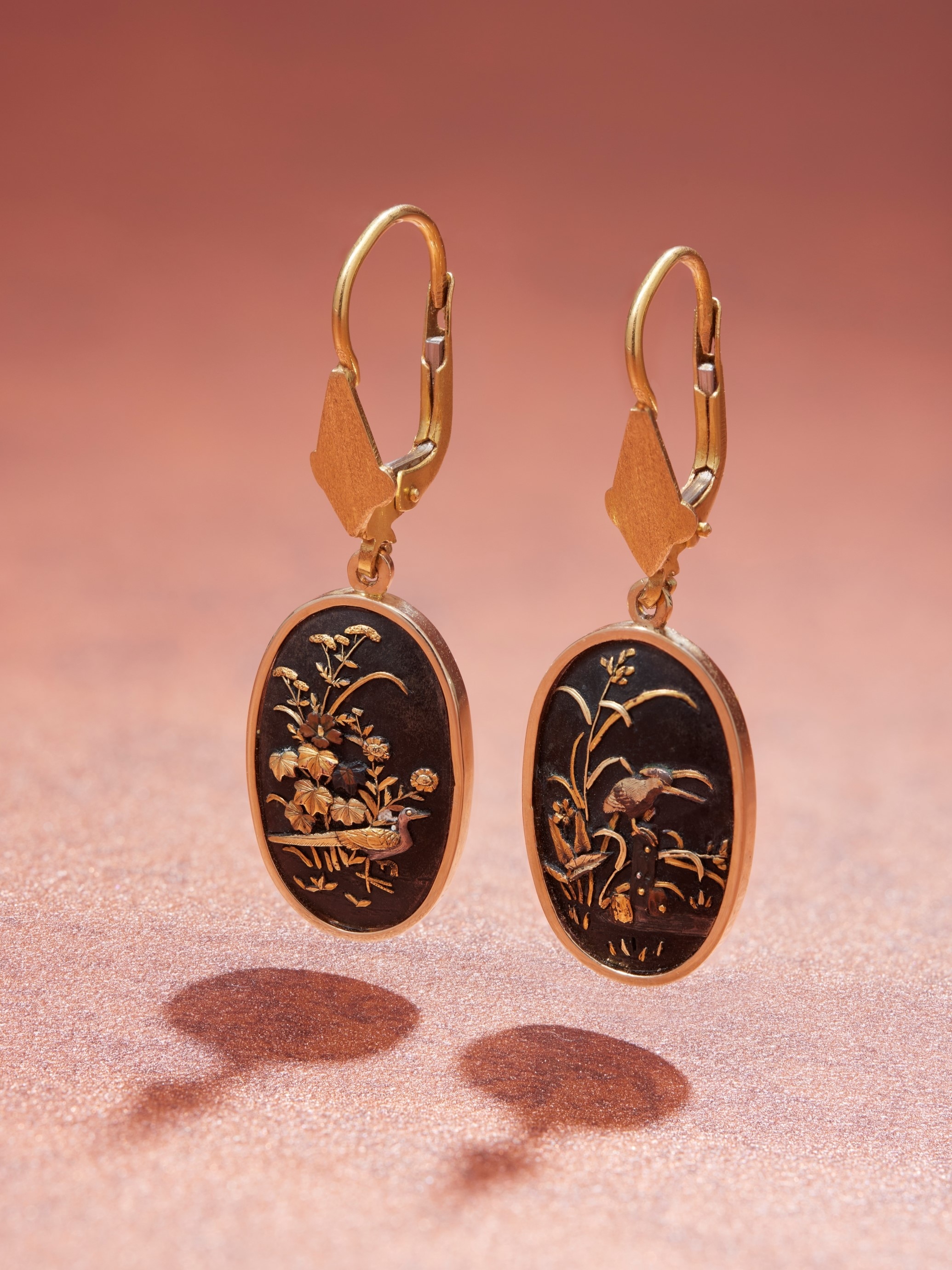 Earrings composed of elements resembling the cap of the samurai sword, Japan, late 1800s. Gold and silver-gilt shakudō. Private Collection. Photo: L'ÉCOLE, School of Jewelry Arts - Benjamin Chelly.