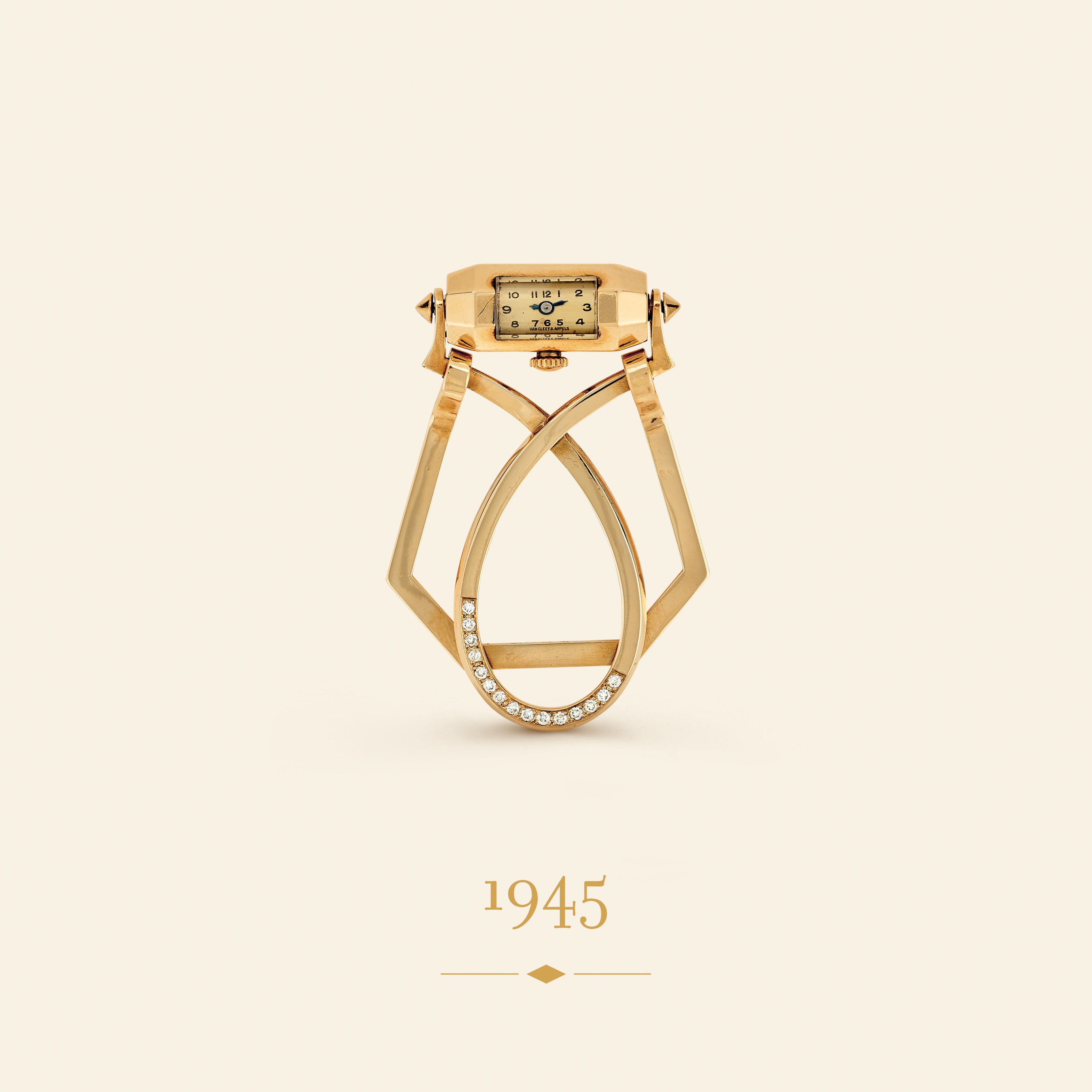 Billfold with watch, 1945. 18K yellow gold, diamonds. Van Cleef & Arpels Collection.