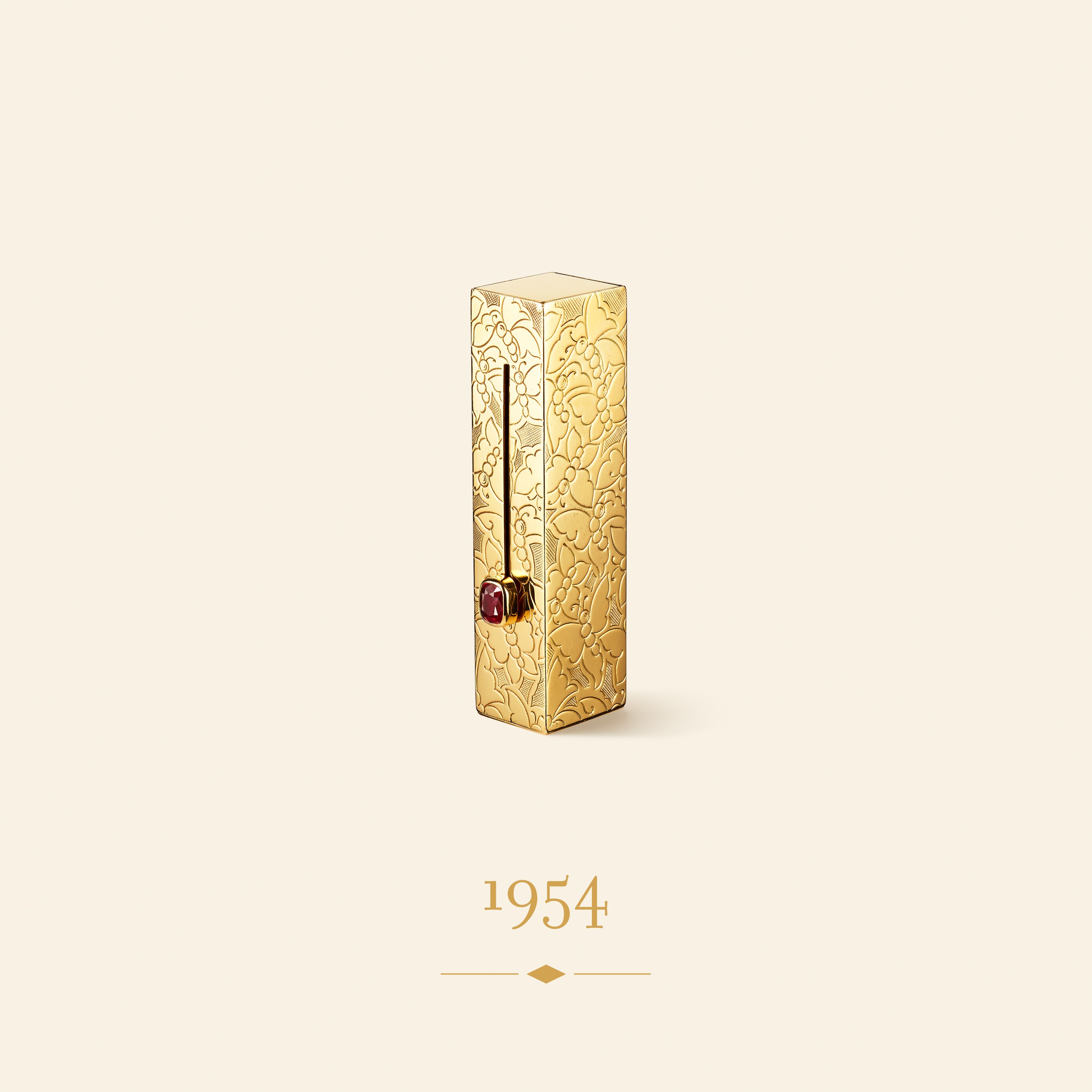 Vanarp lipstick tube, 1954. 18K yellow gold, ruby. Van Cleef & Arpels Collection.