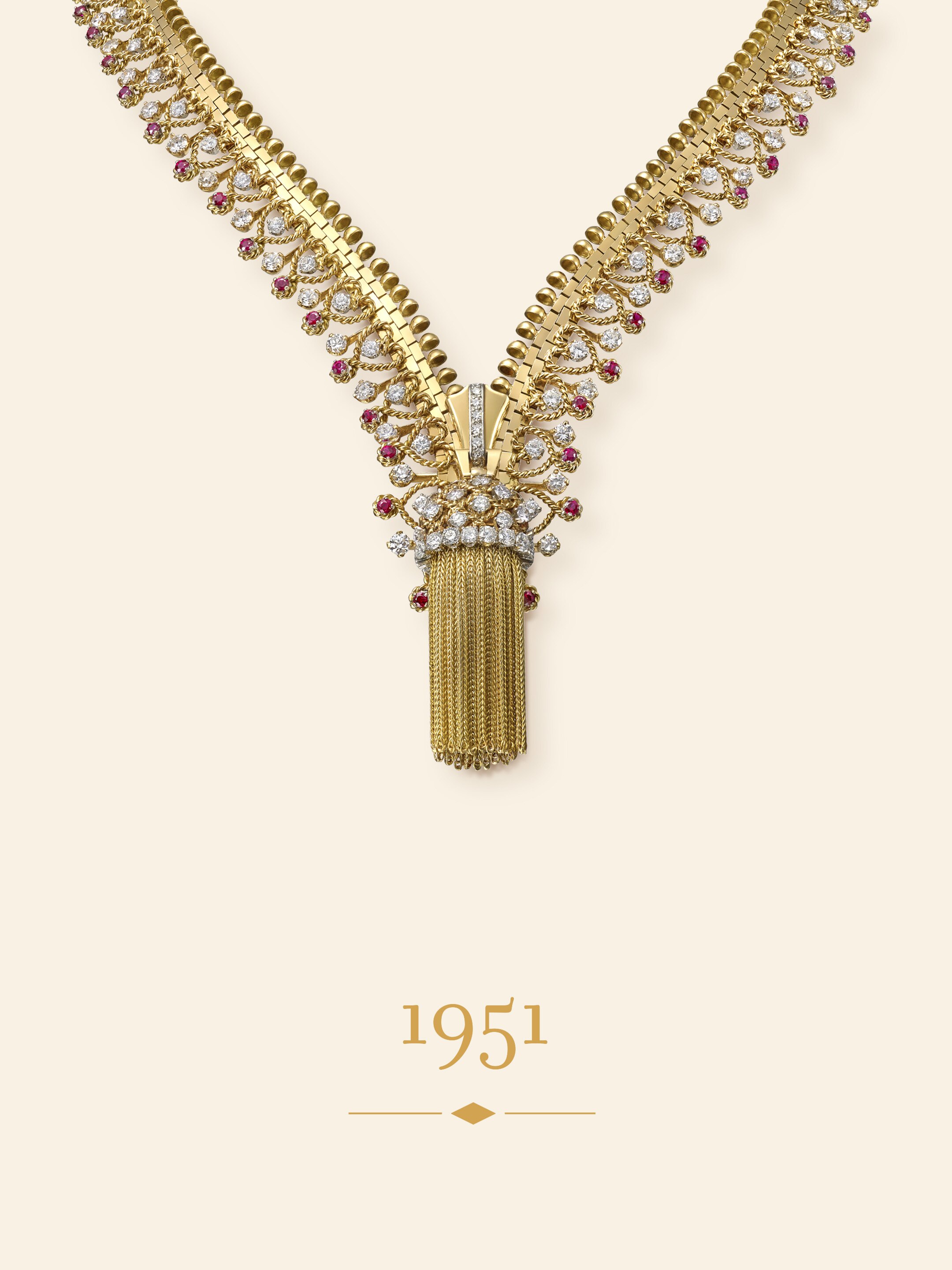 Zip necklace, 1951. Transformable into a bracelet. 18K yellow gold, 18K rose gold, platinum, rubies, diamonds. Van Cleef & Arpels Collection.