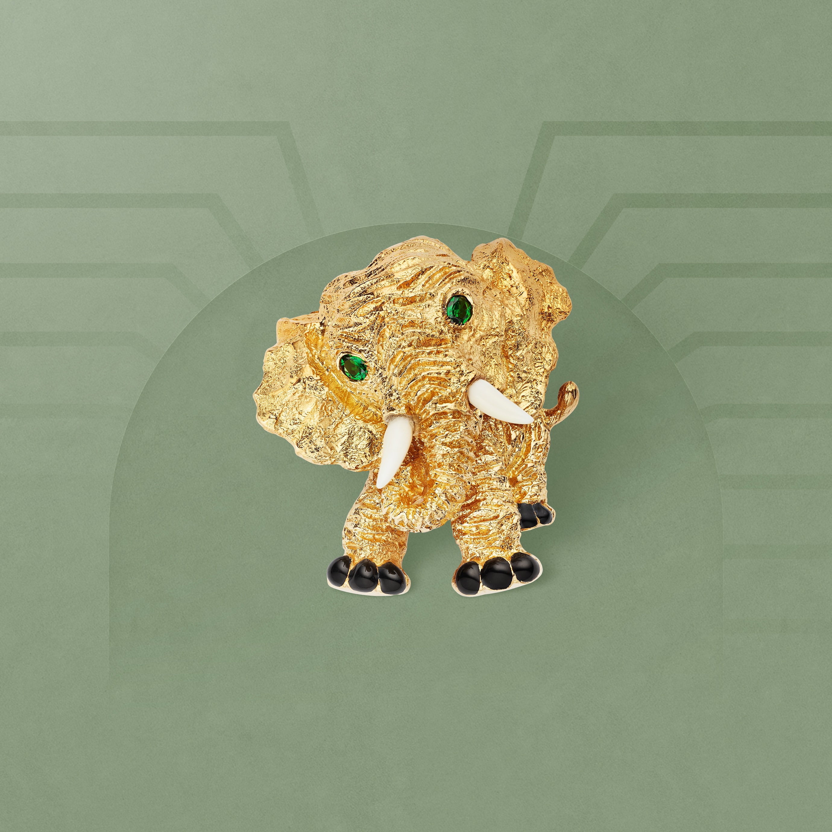 Elephant clip, 1968. 18K yellow gold, tourmaline, shell, enamel. Van Cleef & Arpels Collection.