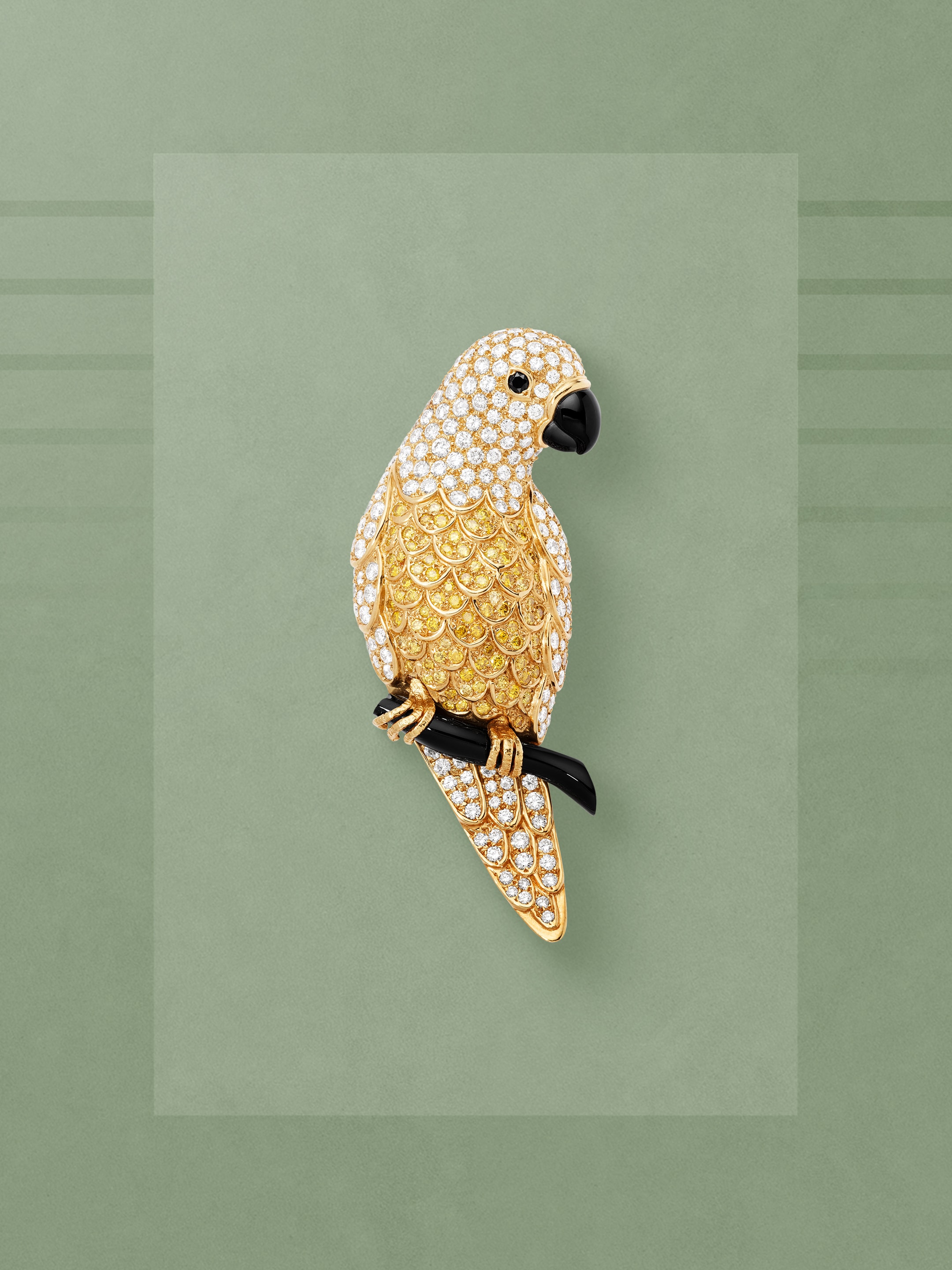 Parrot clip, 1996. 18K yellow gold, onyx, yellow diamonds, white diamonds. Van Cleef & Arpels Collection.