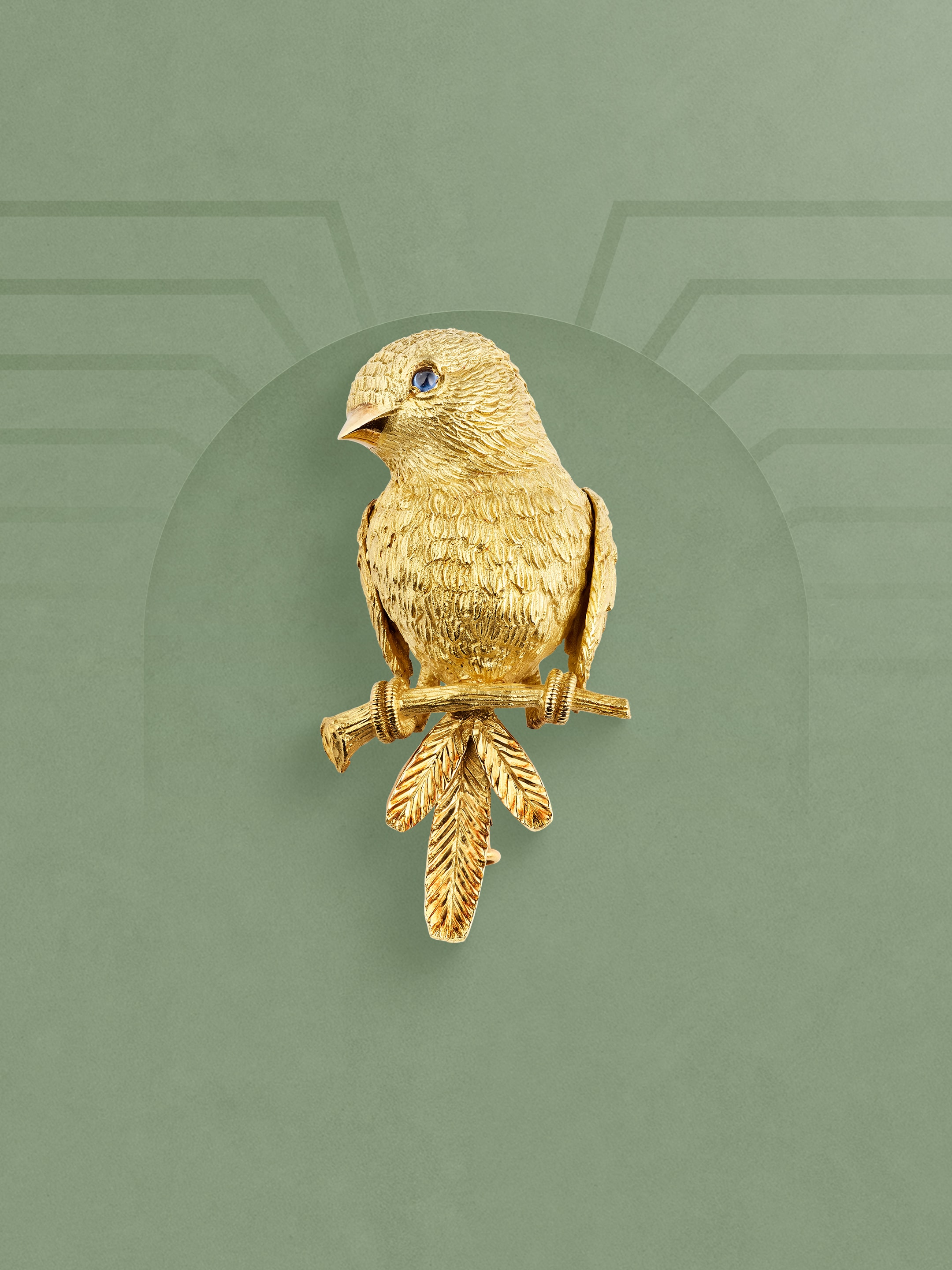 Sparrow clip, 1968. 18K yellow gold, 18K white gold, sapphire. Van Cleef & Arpels Collection.