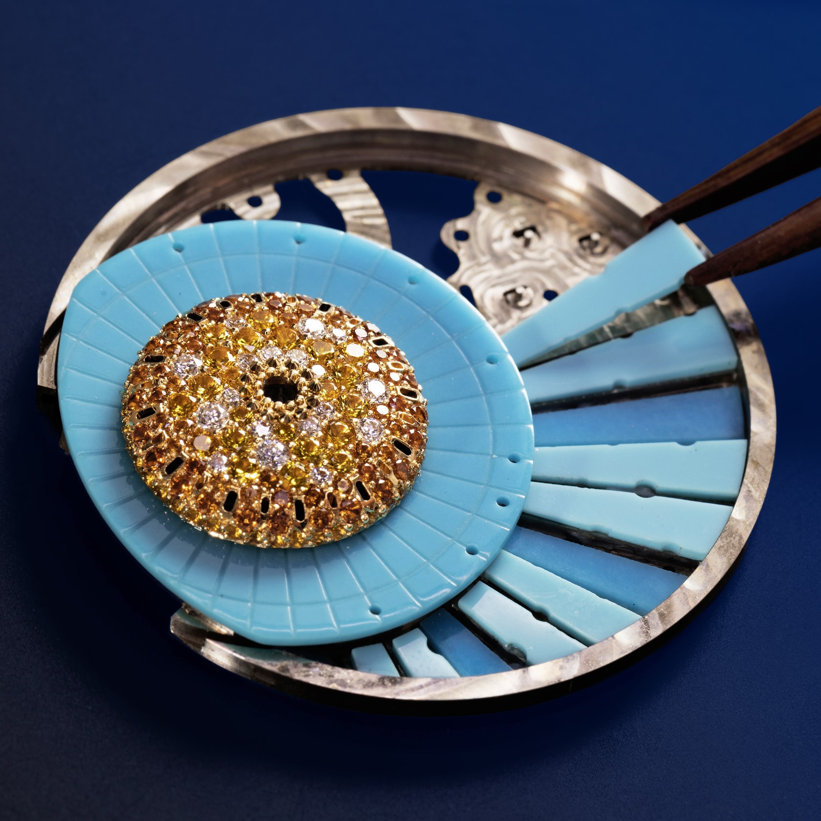 Assembling the turquoise marquetry on the dial. Lady Arpels Jour Enchanté watch, Extraordinary Dials™, Van Cleef & Arpels.