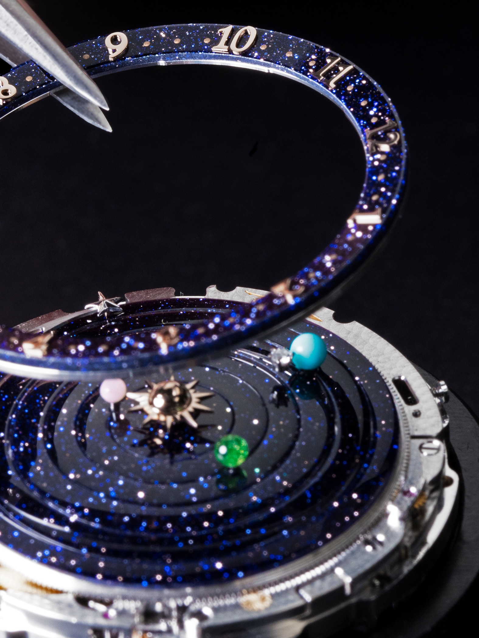 Assembly of the Lady Arpels Planétarium watch. Van Cleef & Arpels.